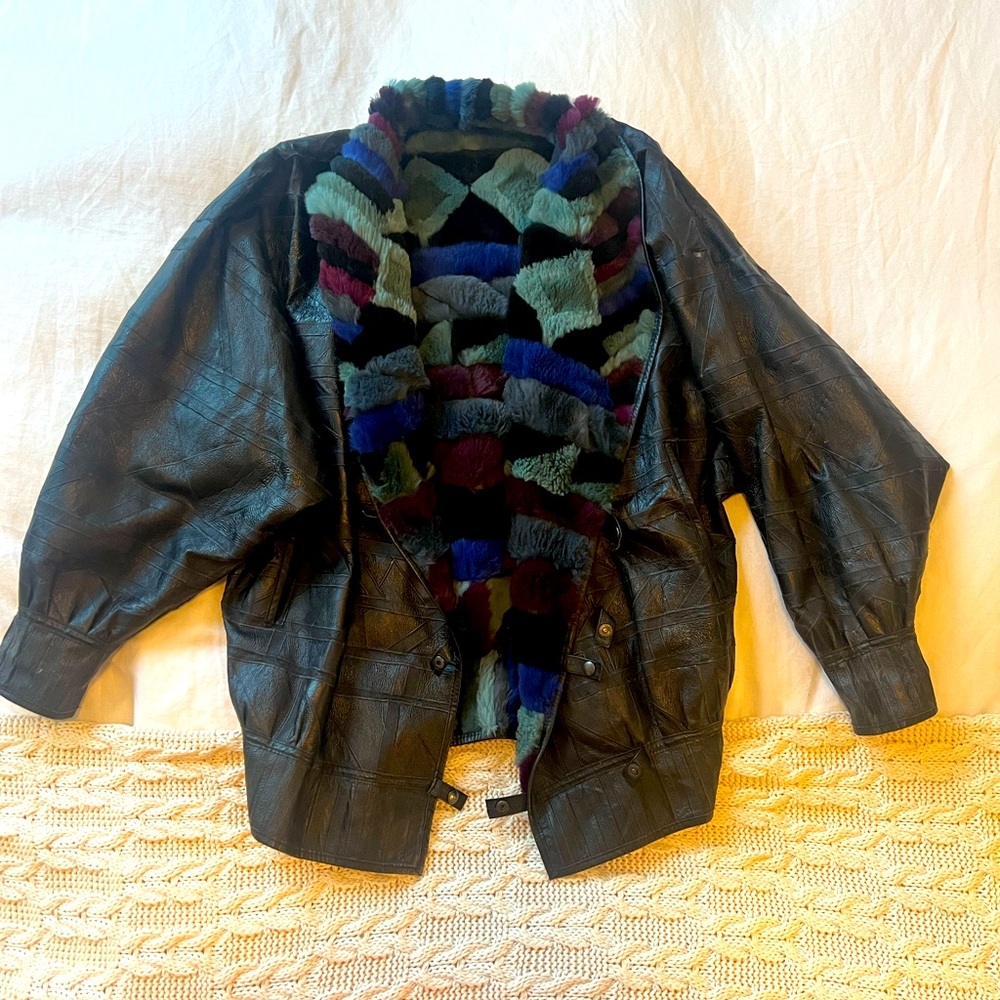 Reversible leather and fur bomber jacket